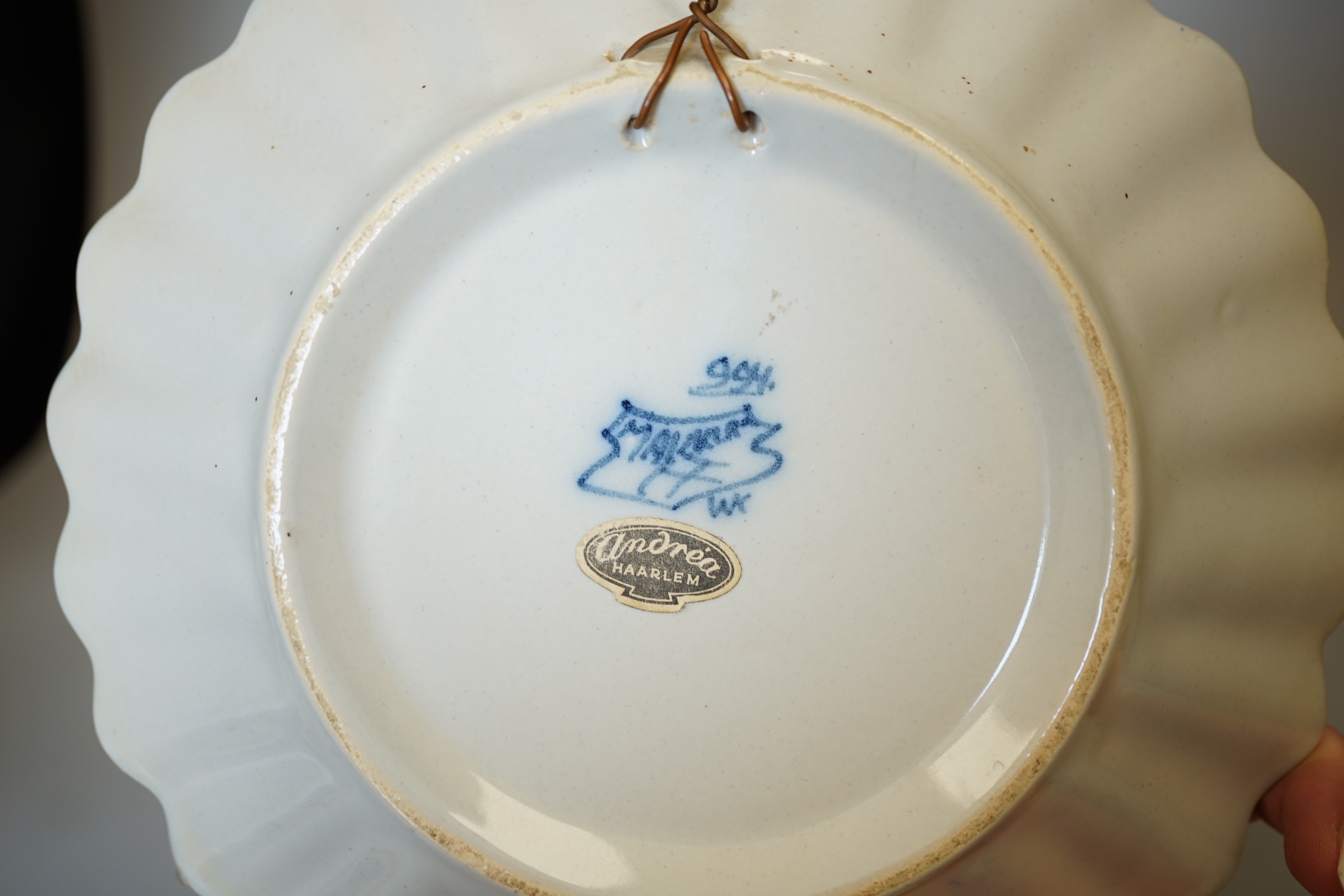 Two delftware dishes, largest 26cm, and a delftware clog